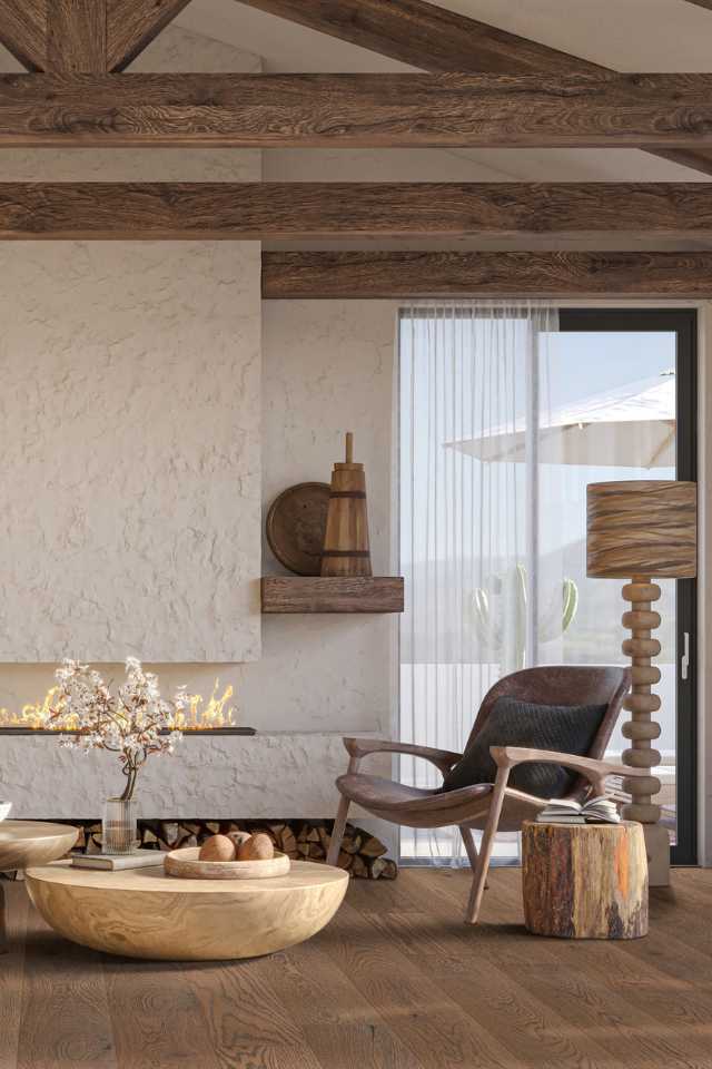 textured wall fireplace in living room with hardwood floors, wood textures and natural wooden beams